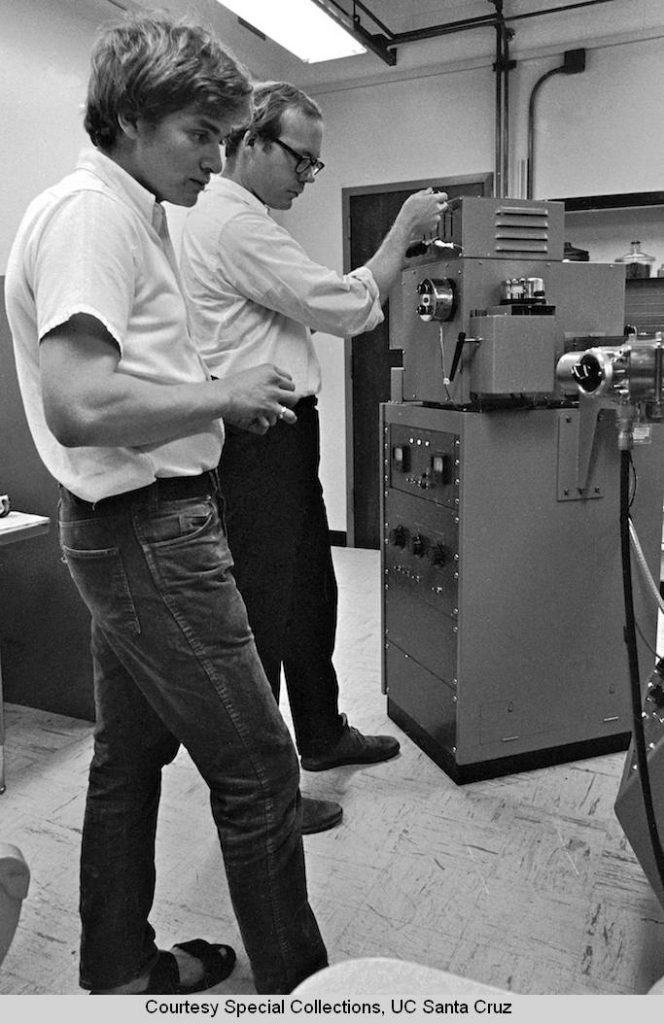 Chemistry_Board_Professor_John_E_McMurry_and_graduate_student_Anthony_Coppolino_BS_1968_Pratt_Institute_examining_the_results_of_a_mass_spectrum